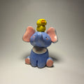 Baby Elephant with Duck on Head – Handmade Ceramic Figurine